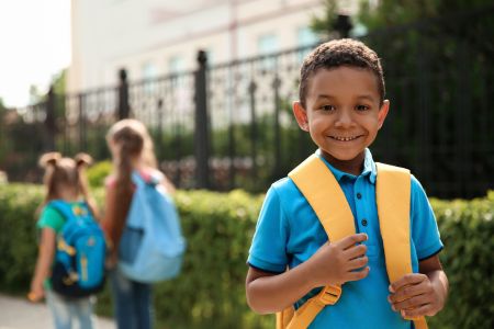 tips for going back to school with catheters - boy with backpack