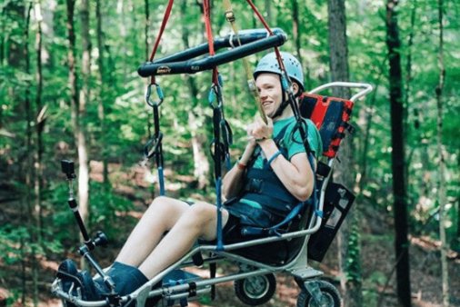 mason ziplining at camp possability retreat