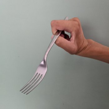 holding a fork with tenodesis after spinal cord injury