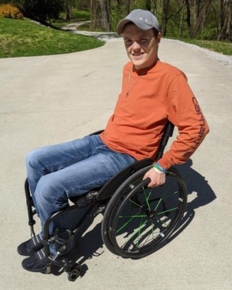 Mason with manual wheelchair